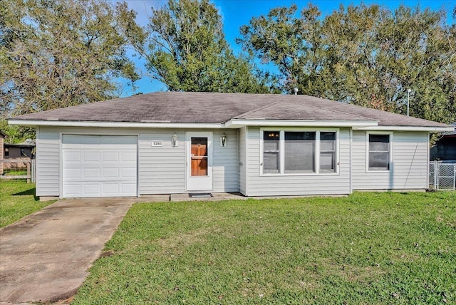 single story home featuring a front yard and a garage