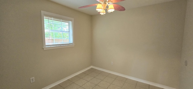 spare room with ceiling fan