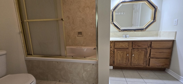 full bathroom featuring tile patterned flooring, bathtub / shower combination, vanity, and toilet