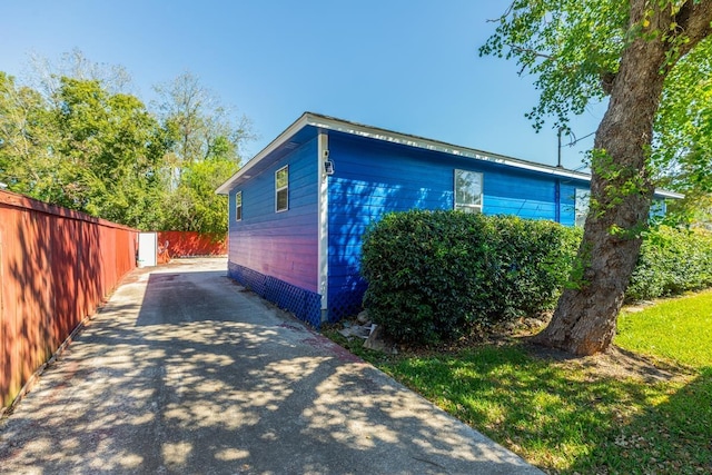 1007 Ewing St, Beaumont, TX 77701 - view of home's exterior with fence