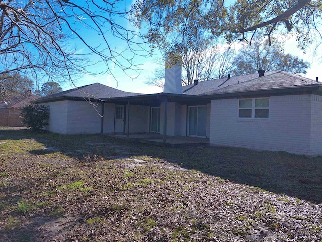 back of house featuring a patio area