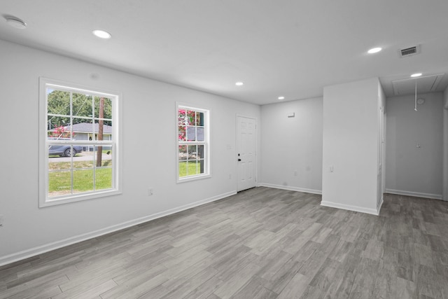 4247 Lansing Ave, Port Arthur, TX 77642 - empty room with attic access, recessed lighting, wood finished floors, and a smoke detector