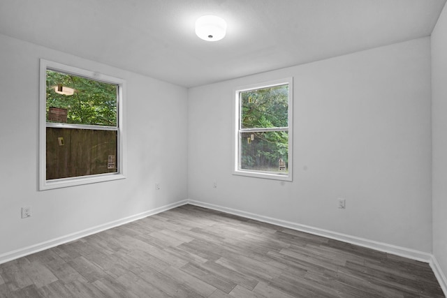 4247 Lansing Ave, Port Arthur, TX 77642 - empty room with wood finished floors and baseboards