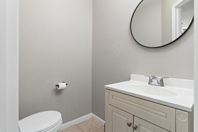 7669 Boardwalk, Lumberton, TX 77657 - half bathroom with vanity, toilet, tile patterned flooring, and baseboards