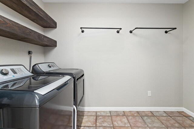 7669 Boardwalk, Lumberton, TX 77657 - laundry room with independent washer and dryer and baseboards