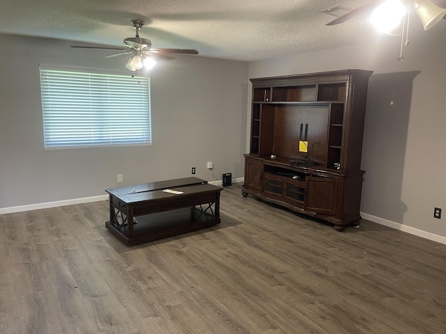 775 Todd St, Beaumont, TX 77707 - living room with ceiling fan, wood finished floors, and a textured ceiling