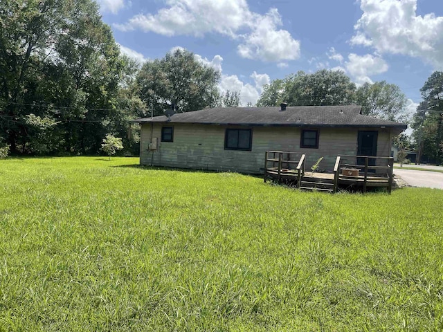 775 Todd St, Beaumont, TX 77707 - back of house with a deck and a lawn