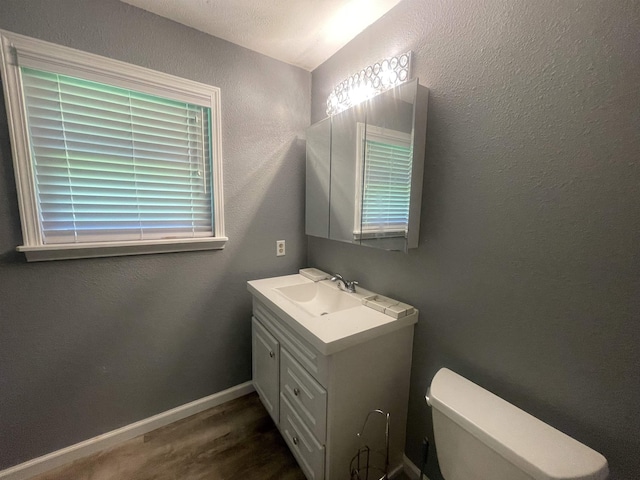 775 Todd St, Beaumont, TX 77707 - half bathroom with vanity and a textured wall