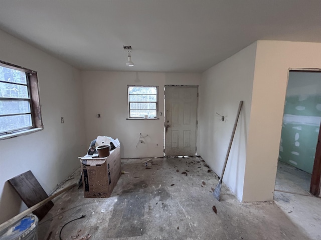 unfurnished dining area featuring visible vents