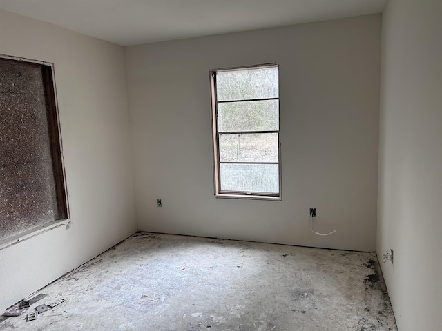 spare room featuring plenty of natural light