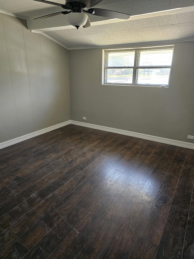 unfurnished room with ceiling fan and dark hardwood / wood-style flooring