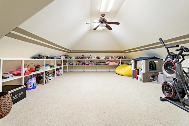 recreation room featuring carpet, ceiling fan, and lofted ceiling