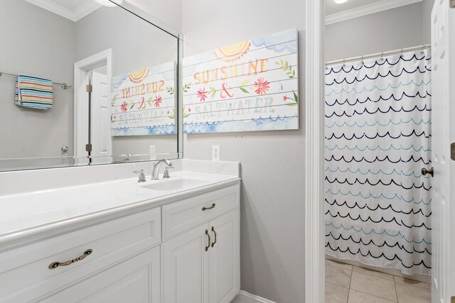 bathroom featuring tile patterned flooring, vanity, curtained shower, and ornamental molding