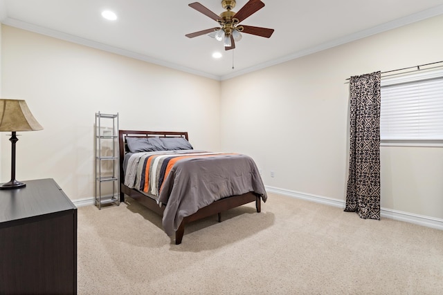 bedroom with ceiling fan, ornamental molding, and light carpet