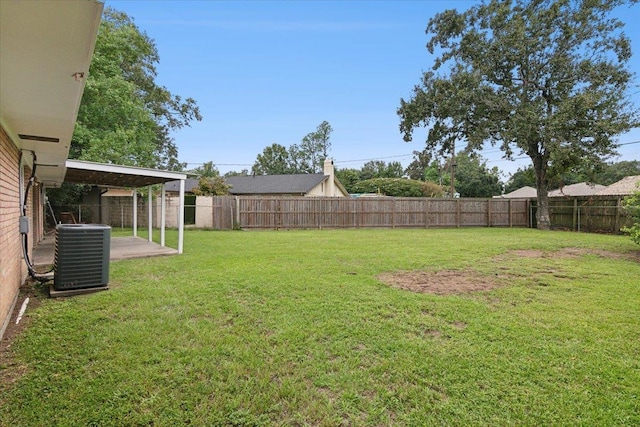 view of yard featuring central air condition unit