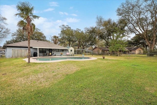 view of yard featuring a patio, a fenced backyard, and a fenced in pool