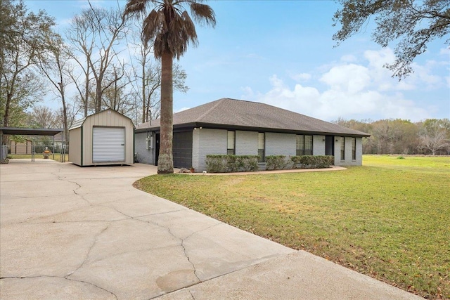 view of front facade featuring a carport, concrete driveway, a front lawn, and brick siding