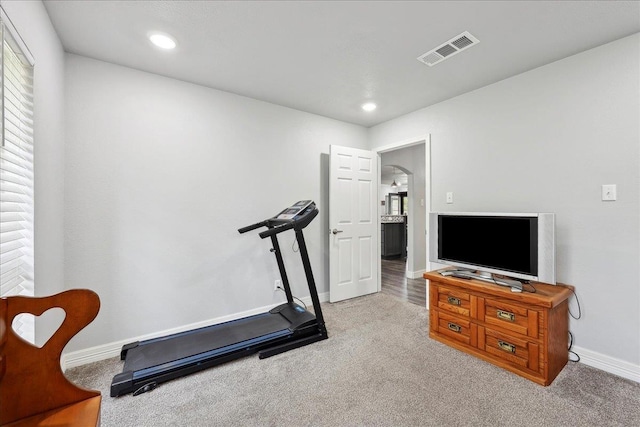 exercise area with recessed lighting, visible vents, baseboards, and carpet flooring