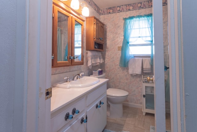 6470 Wilder Dr, Beaumont, TX 77706 - bathroom with toilet and vanity