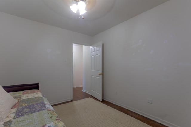 6470 Wilder Dr, Beaumont, TX 77706 - bedroom featuring baseboards, wood finished floors, and ceiling fan