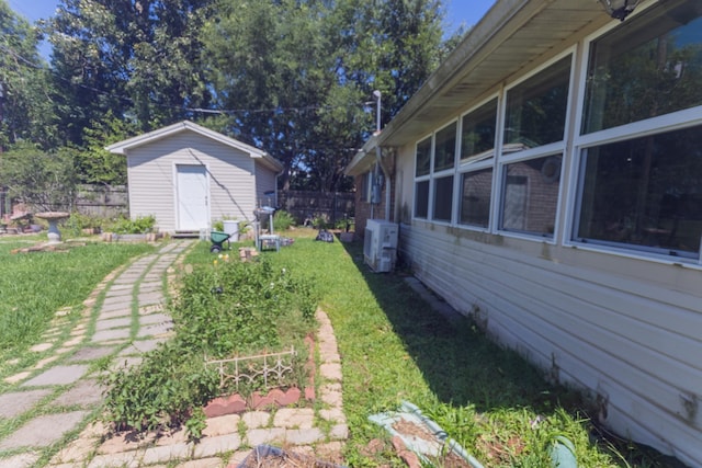 6470 Wilder Dr, Beaumont, TX 77706 - view of yard with an outbuilding