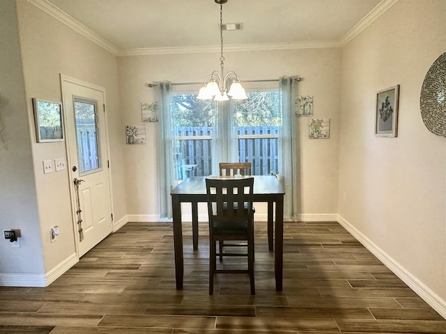 dining room with an inviting chandelier and ornamental molding