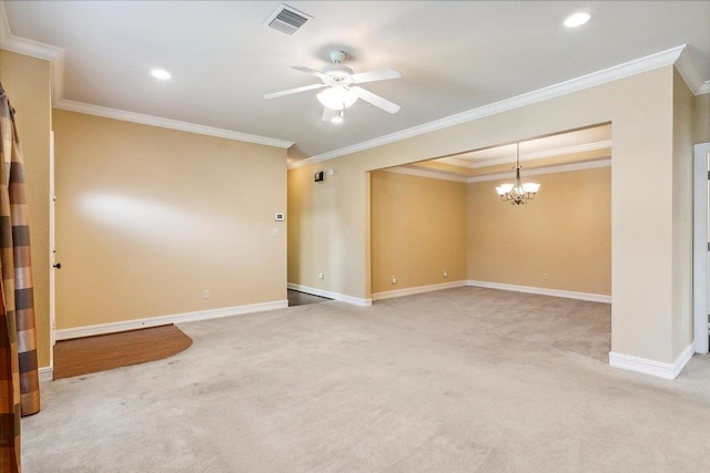 carpeted empty room featuring ceiling fan with notable chandelier and crown molding