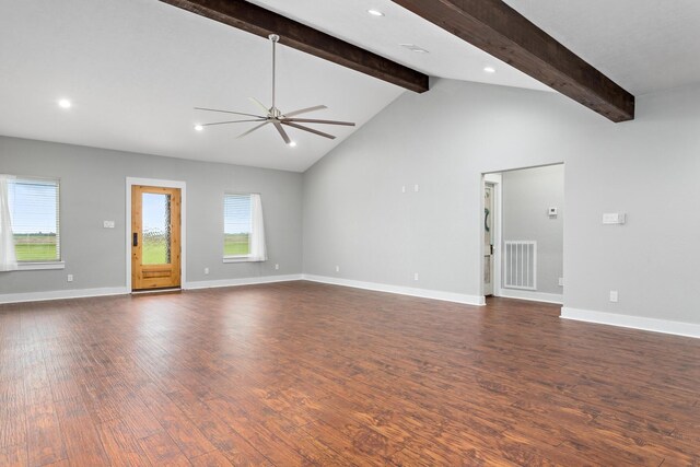 2050 Aggie Dr, Beaumont, TX 77713 - unfurnished living room featuring baseboards, dark wood-style floors, visible vents, vaulted ceiling with beams, and ceiling fan