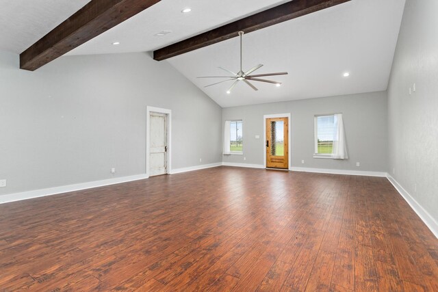 2050 Aggie Dr, Beaumont, TX 77713 - unfurnished living room with high vaulted ceiling, a ceiling fan, dark wood-style floors, baseboards, and beamed ceiling