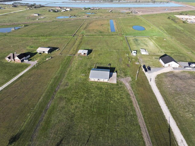 2050 Aggie Dr, Beaumont, TX 77713 - birds eye view of property featuring a water view and a rural view