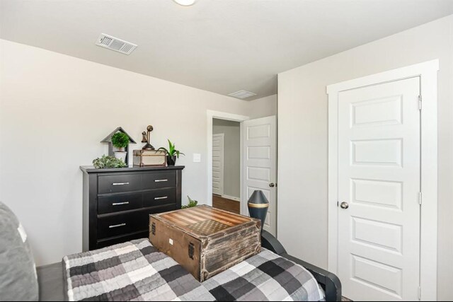 bedroom with visible vents