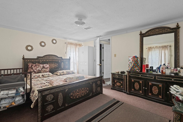 2850 S Major Dr, Beaumont, TX 77707 - carpeted bedroom with a textured ceiling and ornamental molding