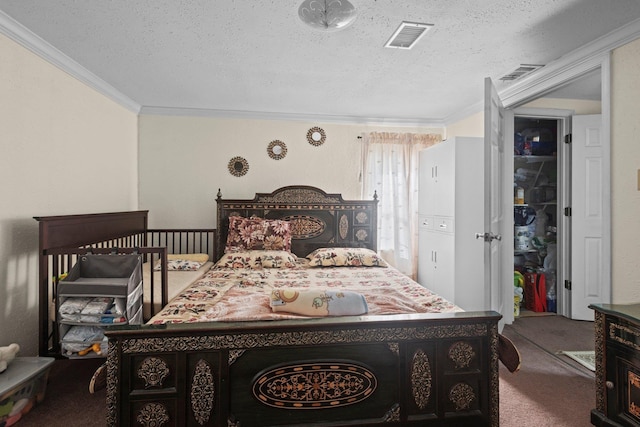 2850 S Major Dr, Beaumont, TX 77707 - bedroom featuring a textured ceiling, carpet, and ornamental molding