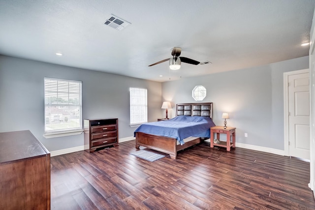 bedroom with dark hardwood / wood-style floors, ceiling fan, and pool table