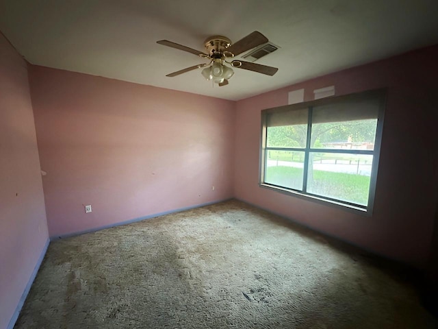849 Dillon Dr, Silsbee, TX 77656 - empty room with carpet flooring and a ceiling fan