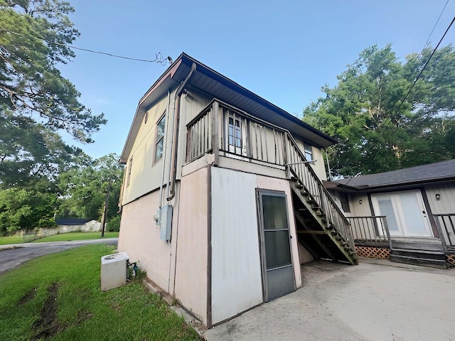 849 Dillon Dr, Silsbee, TX 77656 - back of property with a patio and stairs