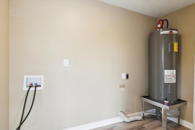 utility room with electric water heater