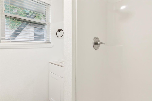 bathroom with a shower