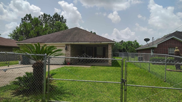 2945 Wilson St, Beaumont, TX 77703 - view of side of home featuring a gate, a shingled roof, and driveway