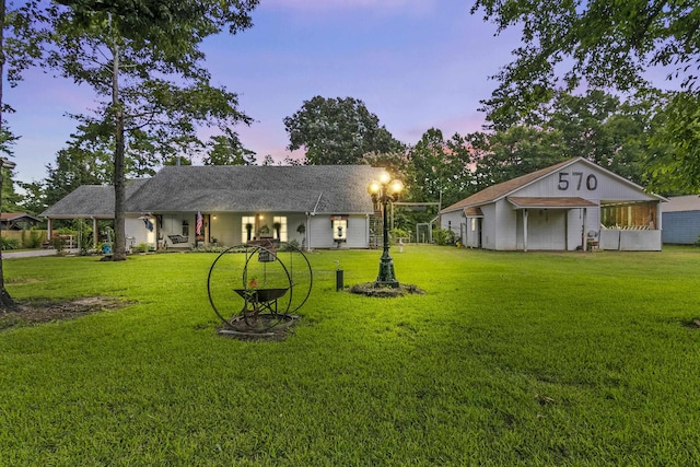 ranch-style house with a lawn