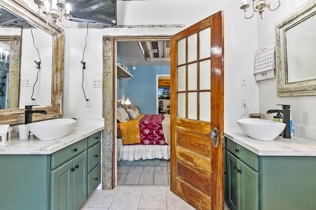 bathroom with vanity and tile patterned flooring