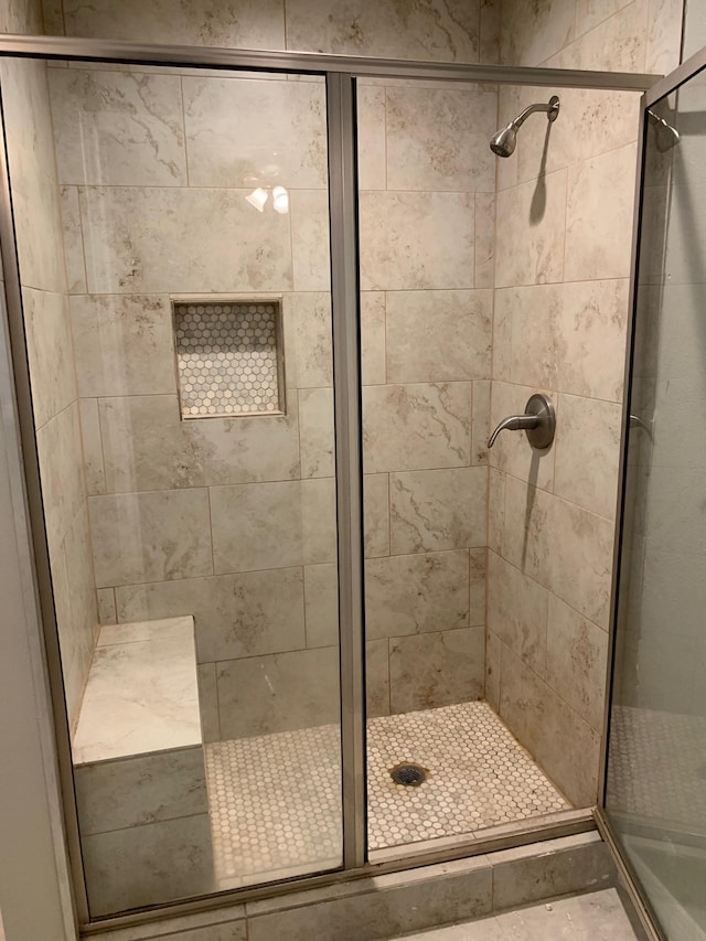 full bath featuring a stall shower