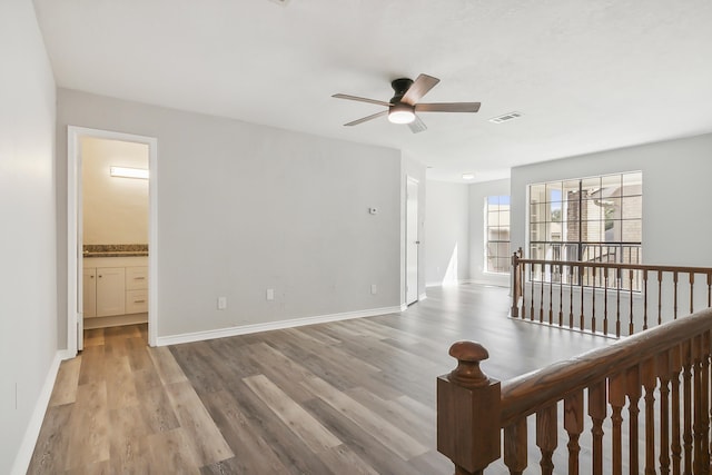 interior space featuring ceiling fan and light hardwood / wood-style flooring