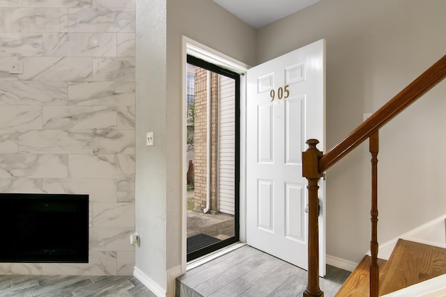 foyer with a fireplace