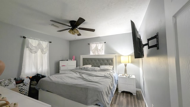 255 Smelker St, Beaumont, TX 77707 - bedroom featuring wood finished floors, ceiling fan, and baseboards
