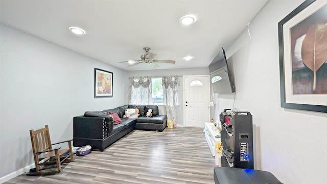 255 Smelker St, Beaumont, TX 77707 - living room featuring a ceiling fan, wood finished floors, baseboards, and recessed lighting
