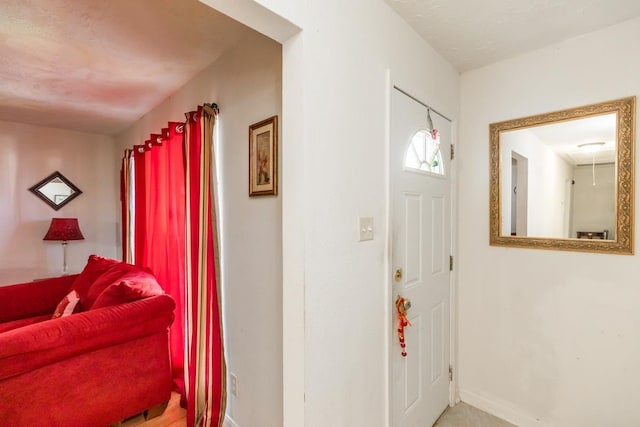 foyer with baseboards