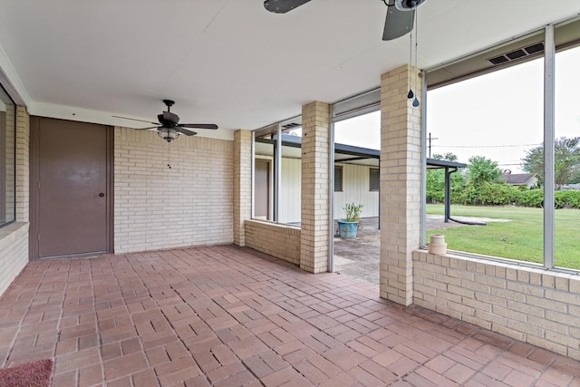 view of patio with ceiling fan