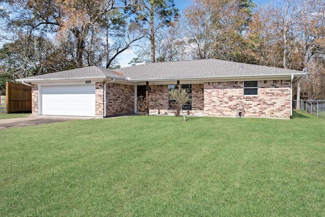 ranch-style house with a garage and a front yard