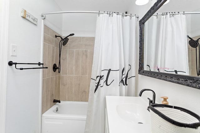 full bath featuring shower / bath combo with shower curtain and a sink